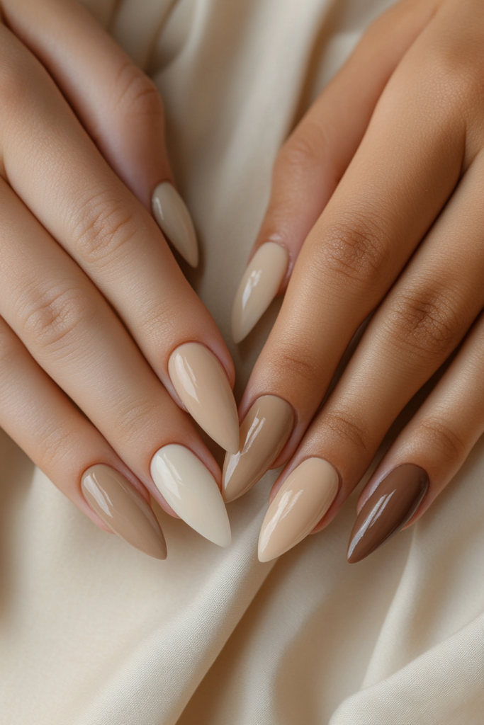 rending Nail Shapes for 2025 A variety of nail shapes including almond, squoval, and stiletto with trendy designs.
